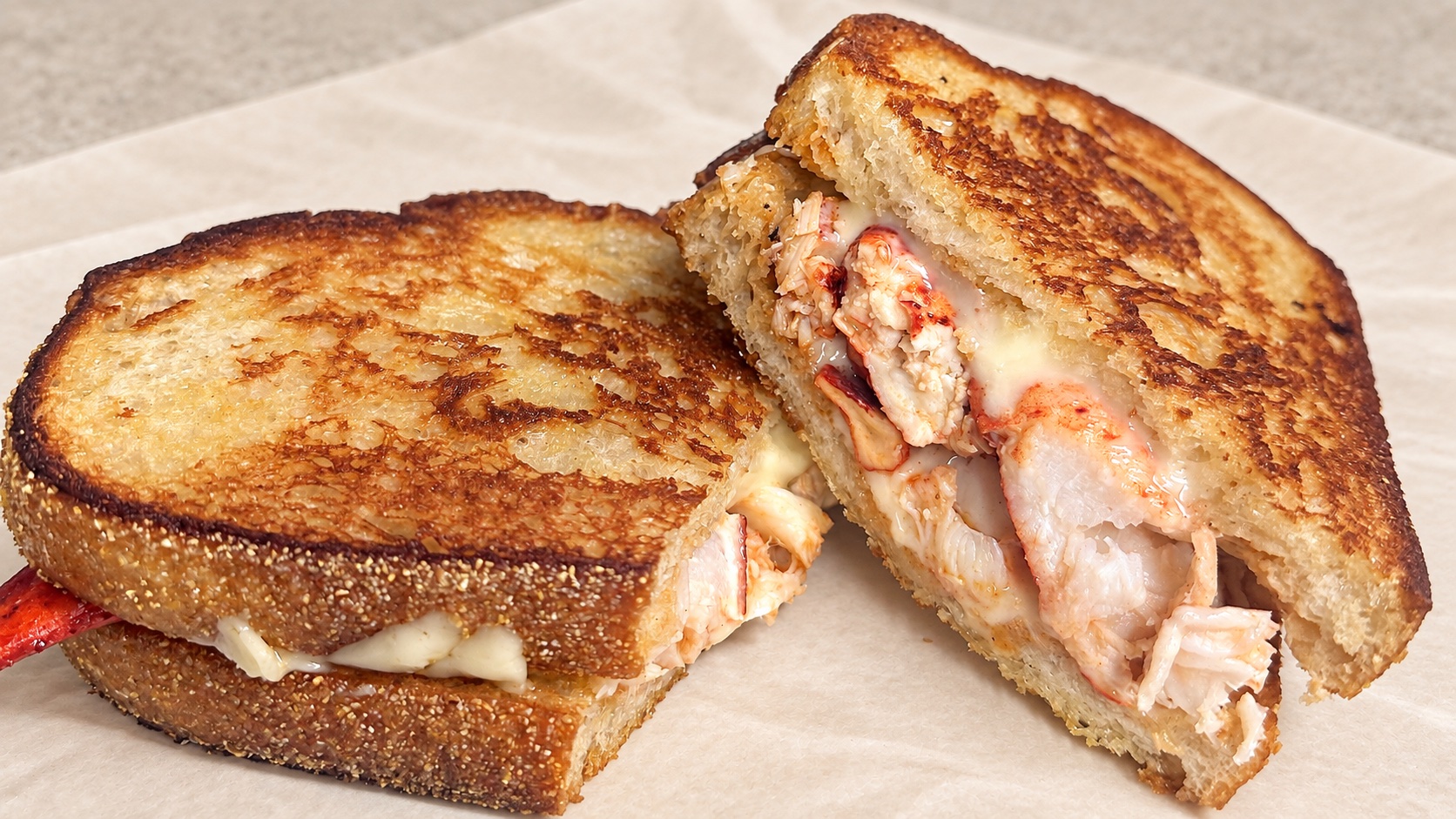 Grilled cheese sandwich filled with lobster