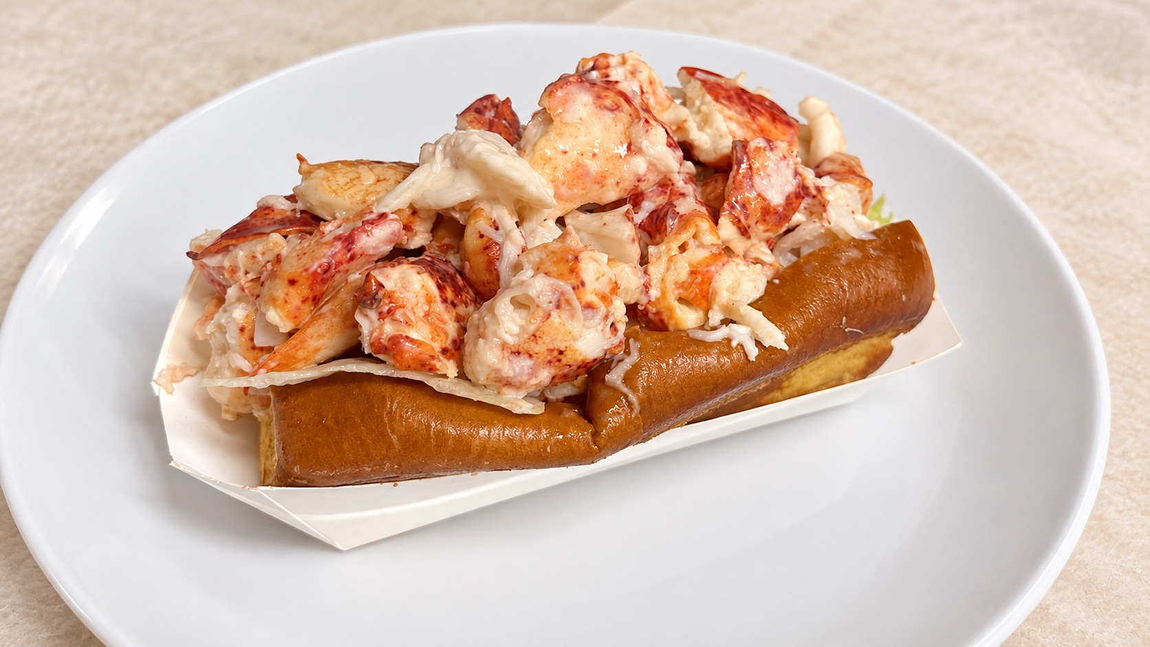 Lobster roll filled with fresh lobster meat